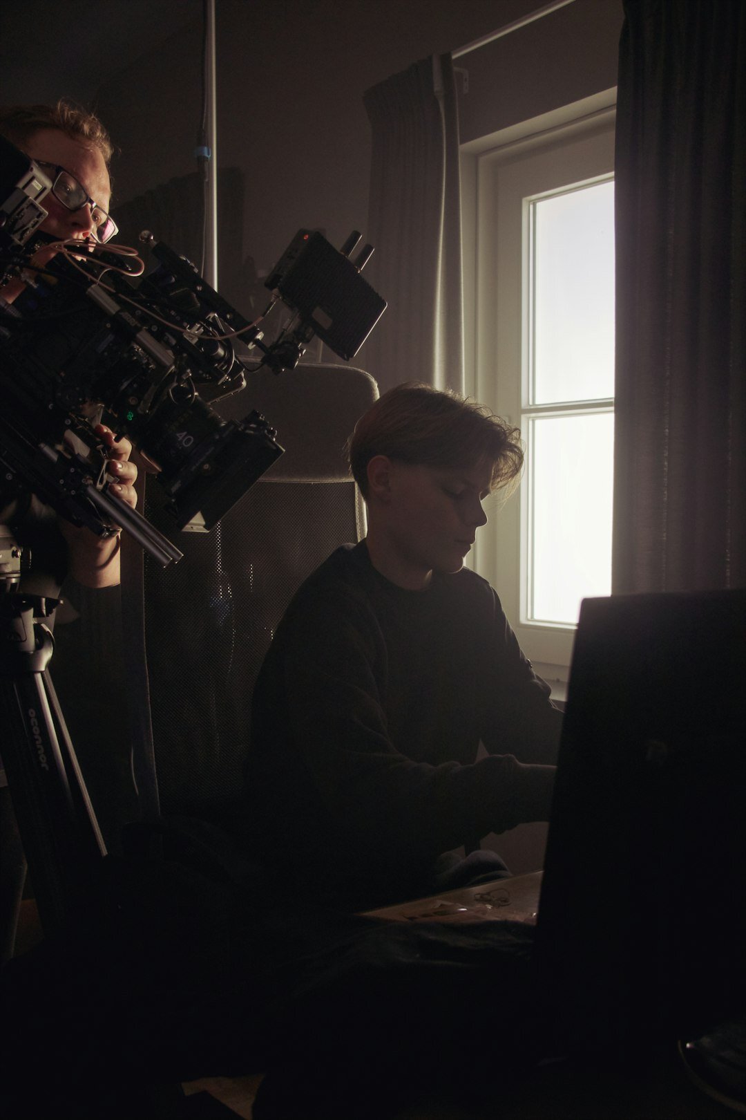 Finnish camera operator filming a live studio broadcast